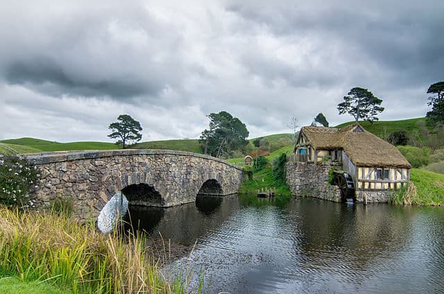 Bridge crosses over to the local mill in Hobbiton, New Zealand, the real life version of the Shire.