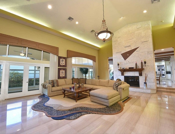 the living room of Shaq's house, with a fireplace