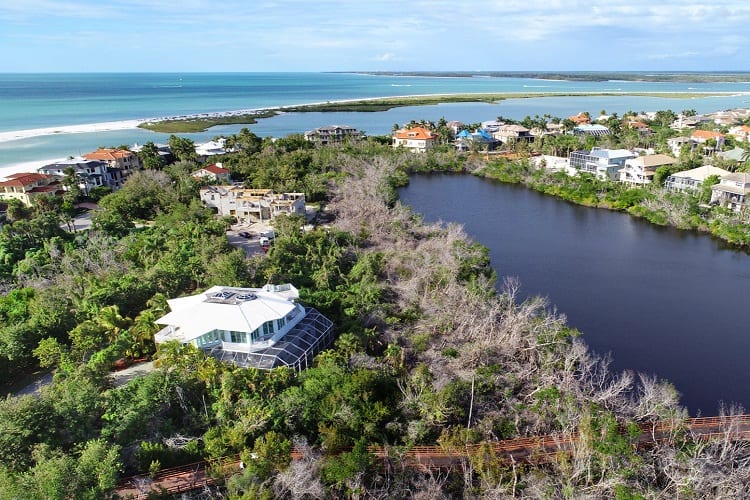 hideaway beach home on private lot going to auction