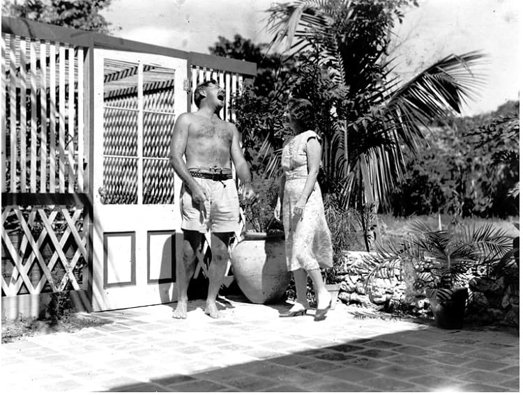 Hemingway next to the pool of his house in Key West.