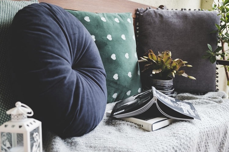 couch with books on it