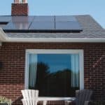 house with solar panels clean energy