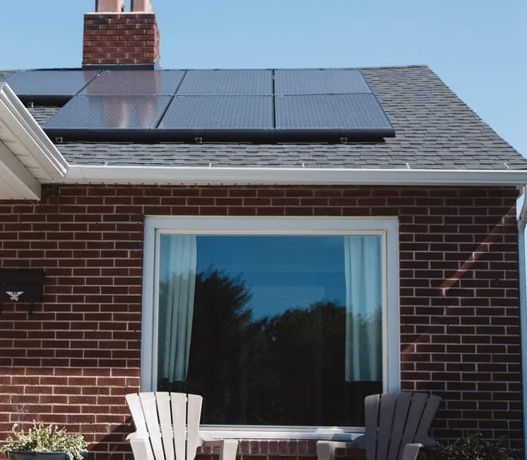 house with solar panels clean energy