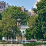 view of Gracie Mansion in NYC, partially covered by trees