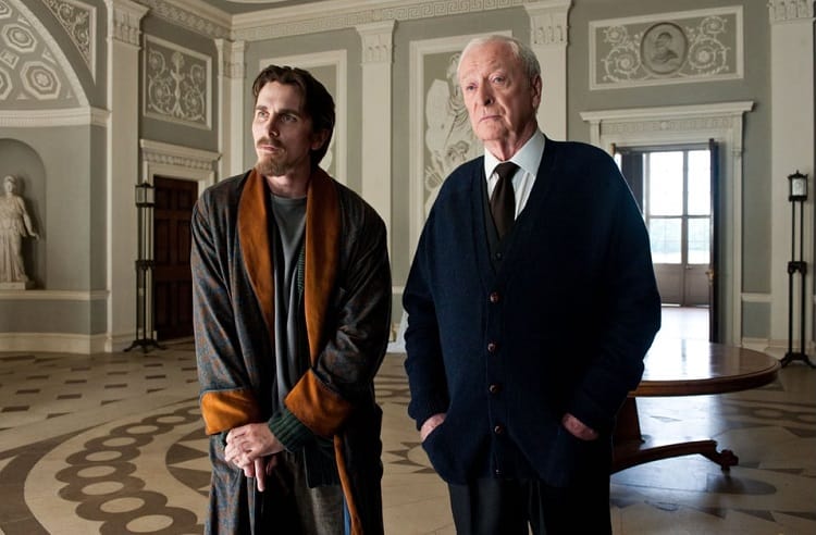 Bruce Wayne and Alfred inside the Wayne Mansion.