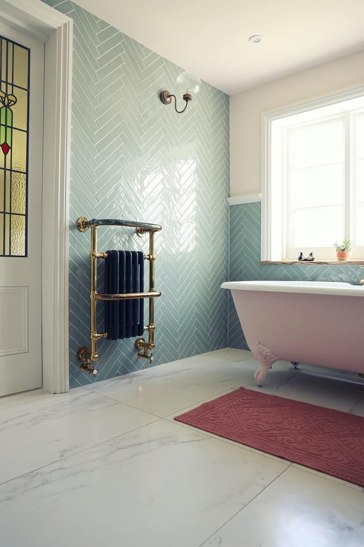 pink bathtub in elegant bathroom