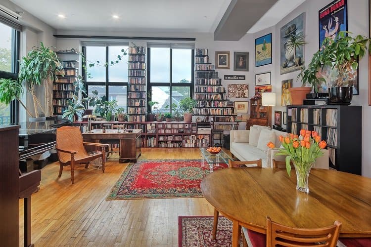 apartment with walls of books