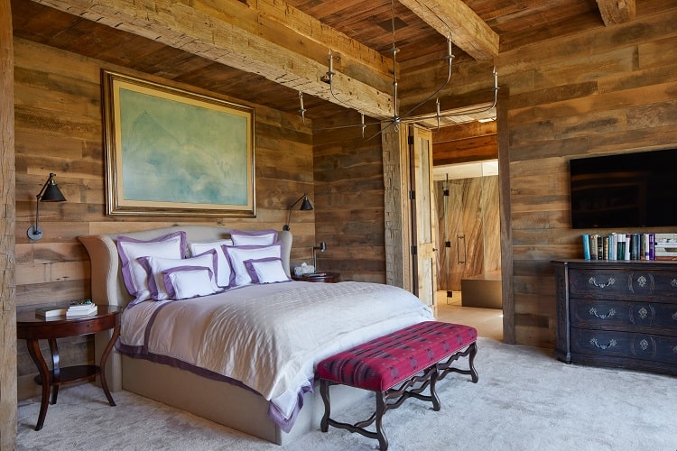 wooden bedroom of a luxury home in aspen