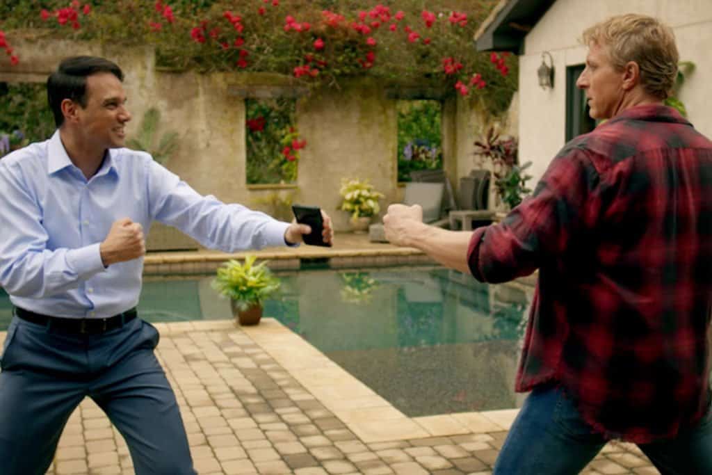 daniel and johnny fighting next to daniel's pool 