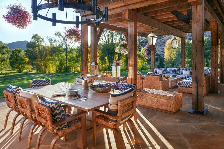 outdoor entertaining area of a luxury aspen ranch in colorado