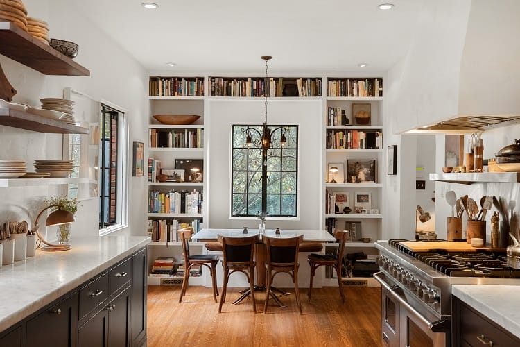 kitchen dining area with incorporated bookshelves