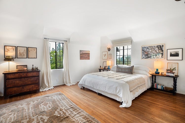 the bright and spacious master bedroom