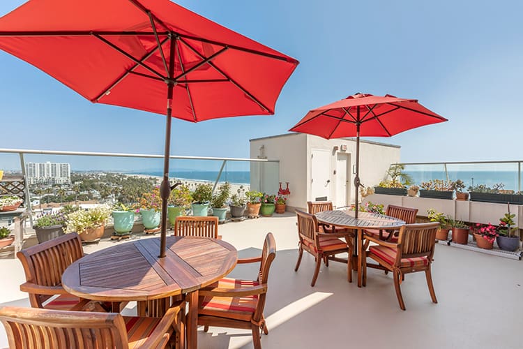 Roof patio overlooking the ocean at a top-rated senior living community in Santa Monica, west of downtown Los Angeles,