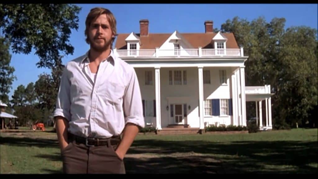 Noah standing in front of the house in The Notebook. 