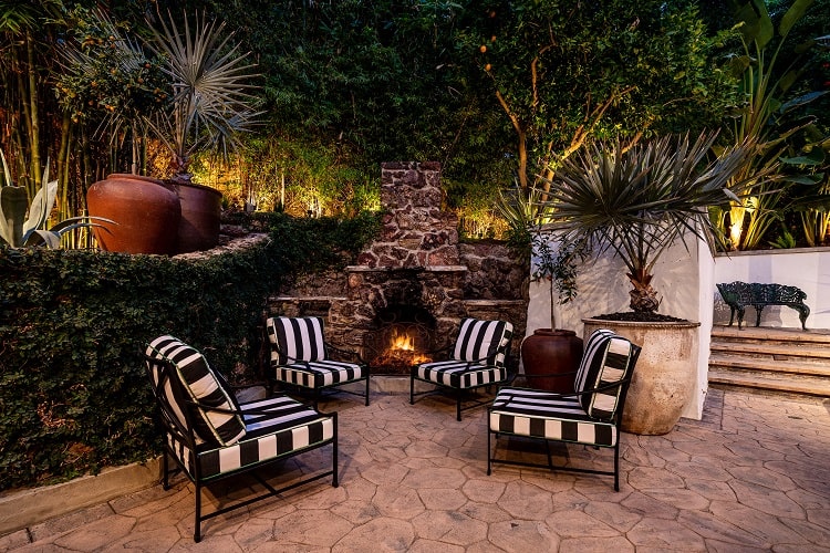 outdoor seating with a fireplace