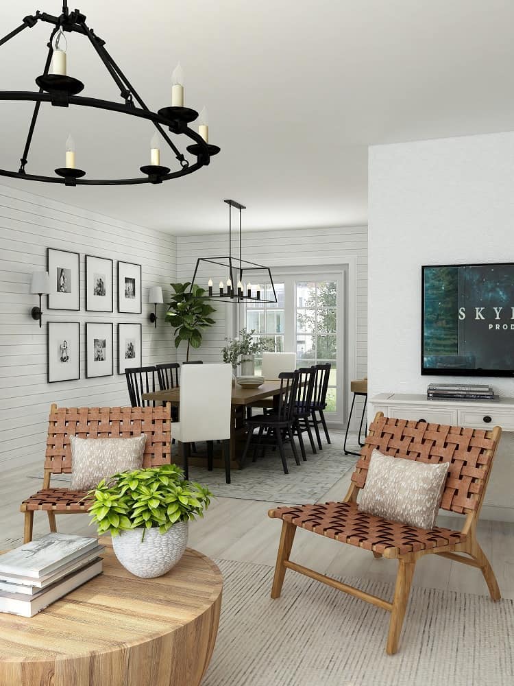 beautifully decorated living space leading into a stylish dining room