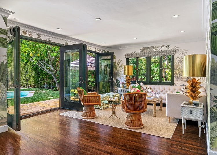 beautiful sun room with intricate wallpaper design