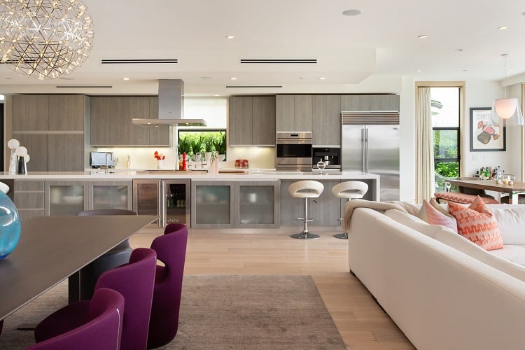 ultra-modern kitchen with a 24-foot stone island