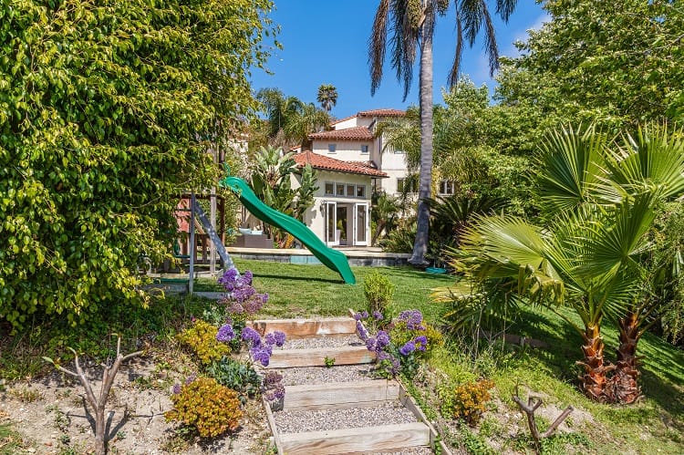 malibu house surrounded by greenery