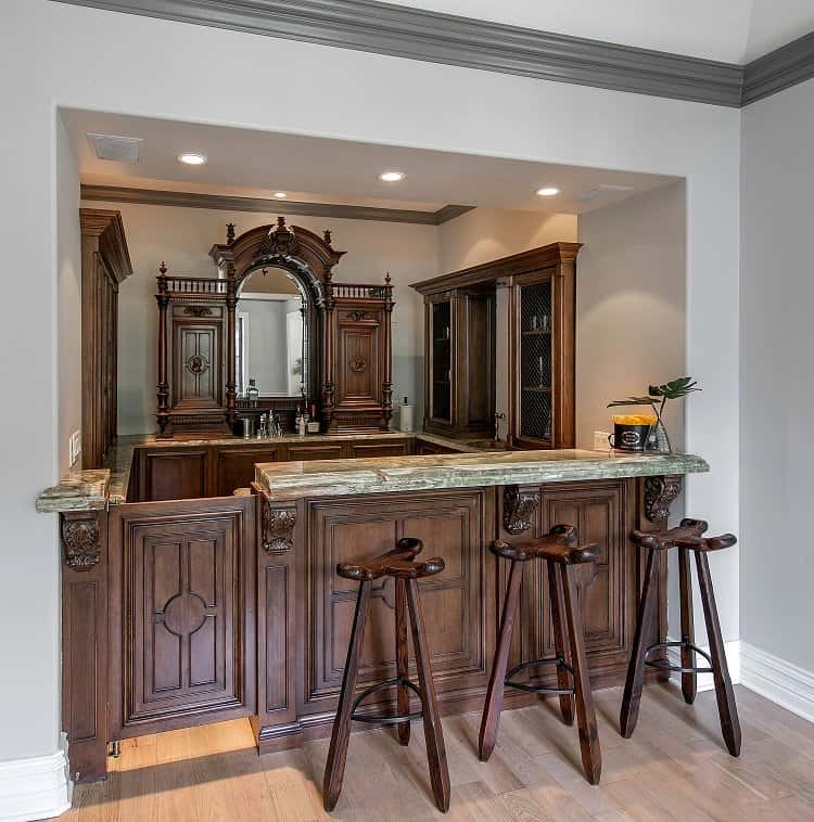 elegant wooden home bar with wood built-ins