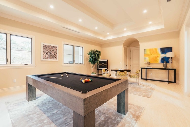 There's a game/billiard room on the main level.