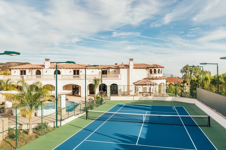 outdoor tennis court in Polo G's house