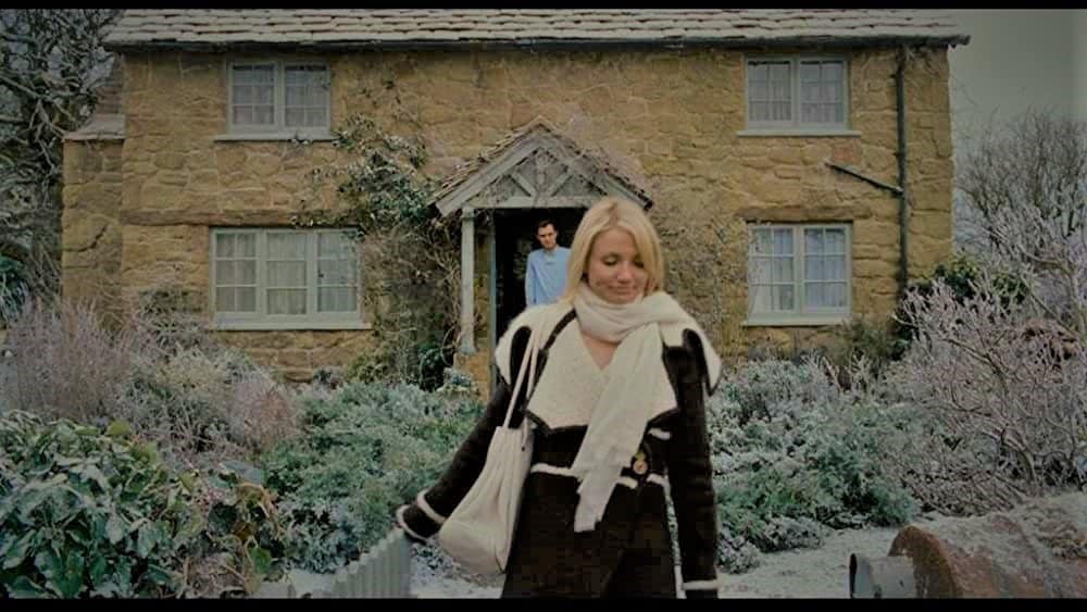 Scene from The Holiday movie showing Amanda (Cameron Diaz) outside Iris' cottage