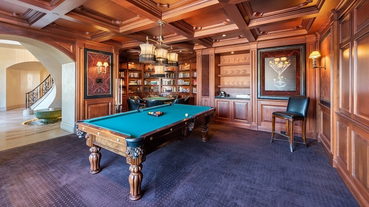 elegant game room with billiards table