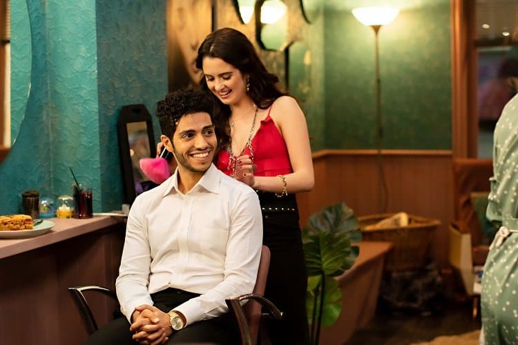 The meet cute scene from The Royal Treatment. (L-R) Mena Massoud as Prince Thomas, Laura Marano as Izzy.
