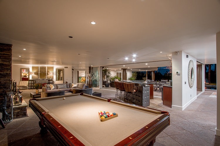 living room with pool table inside Bing Crosby's former home