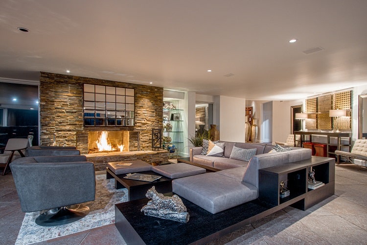 living room with fireplace inside Bing Crosby's former home