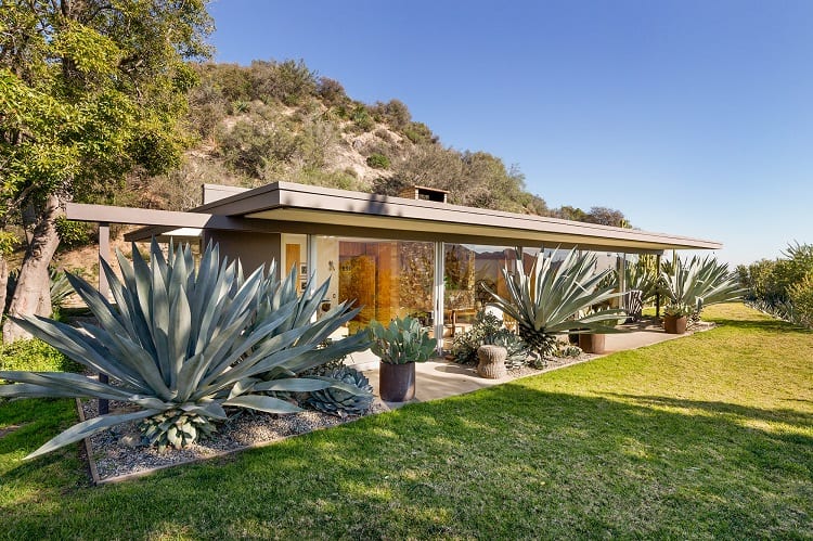 Exterior of a single-level midcentury house designed by architect Richard Neutra