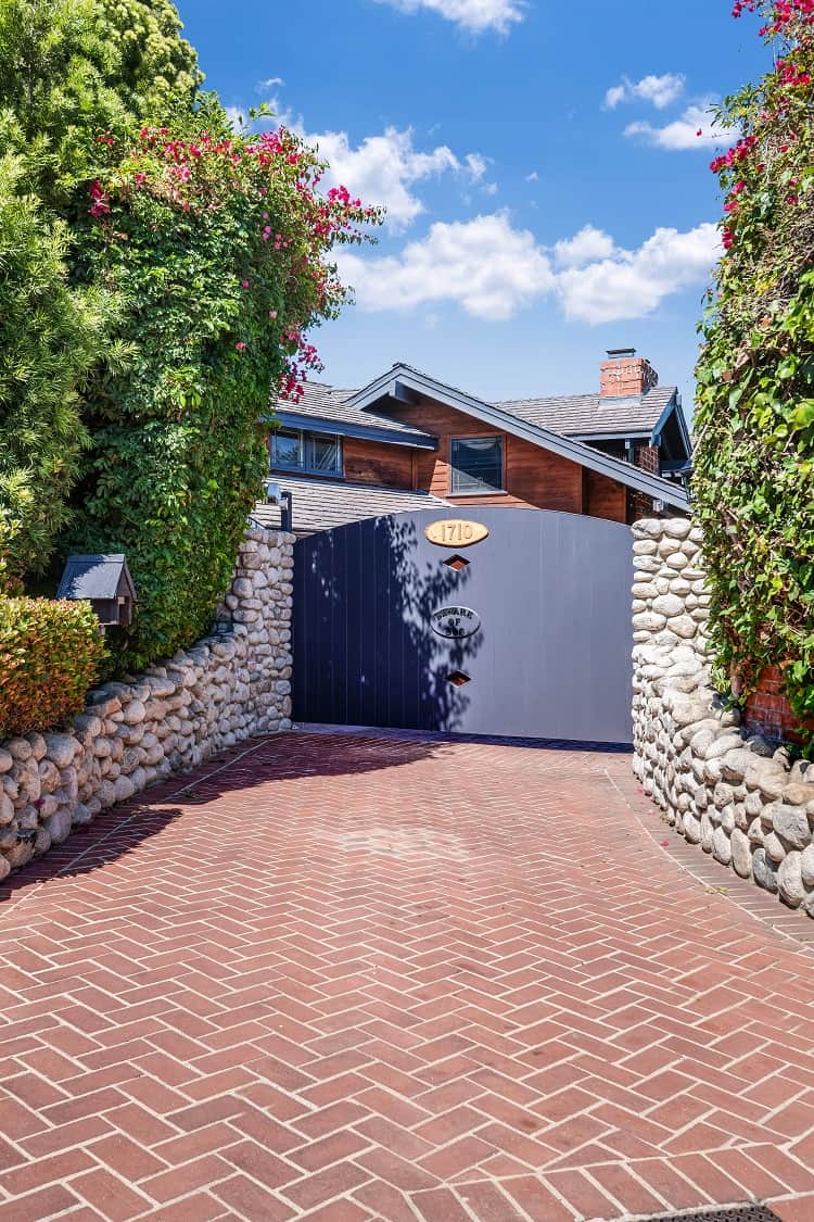 pave way and gated entrance leading to Brooke Shields' former home in Los Angeles