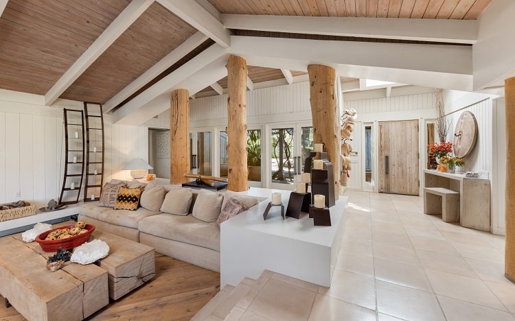 living room in a midcentury house with exposed beams