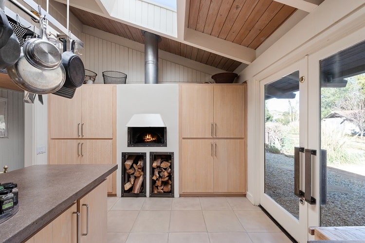 wood pizza oven in the kitchen of a celebrity home