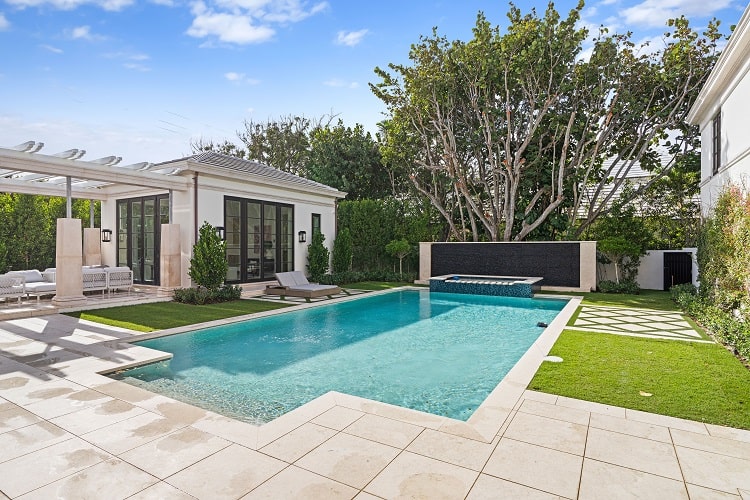 backyard with pool and pool cabana in Palm Beach