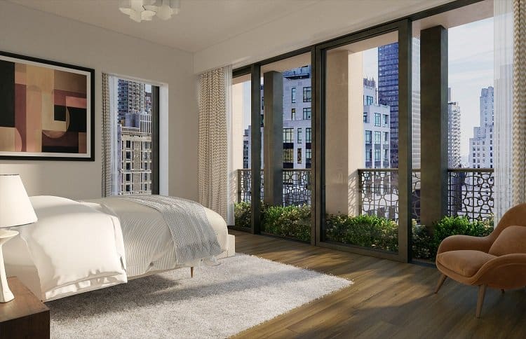 bedroom inside the flatiron house with a garden on the balcony