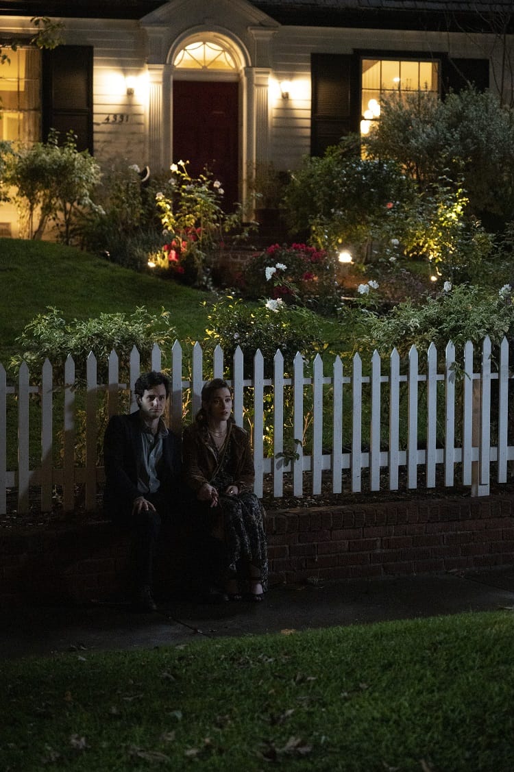 Joe and Love sitting in front of their house in You, season 3. 