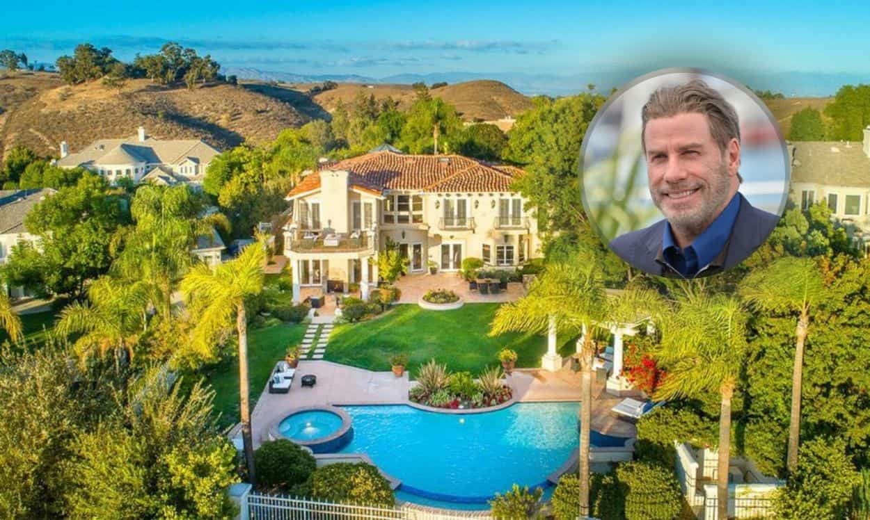 Built in 1993, John Travolta's house is a Spanish-style home