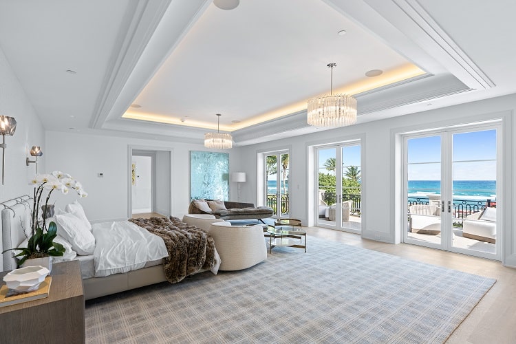 massive bedroom with terrace that overlooks the ocean