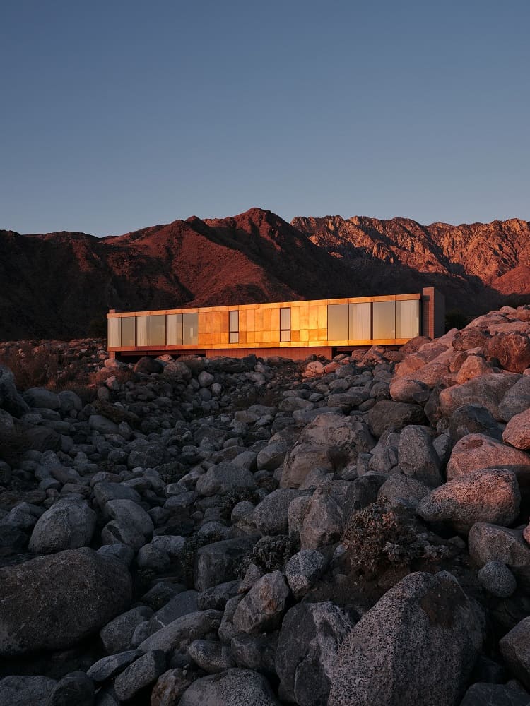 view of the architectural Woods House at sunset