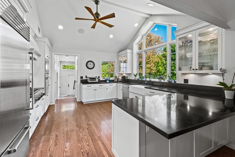 black and white kitchen with bay window