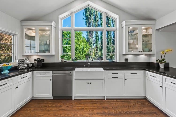 black and white kitchen with bay window