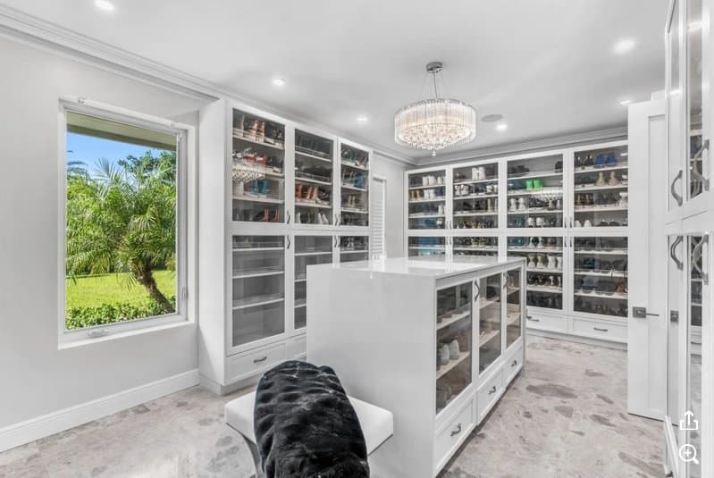 The generous walk-in closet inside Bhad Bhabie's house in Boca Raton, Florida.