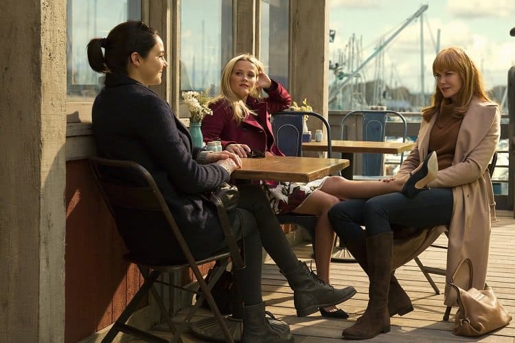 three of the main characters in Big Little Lies sitting in a cafe