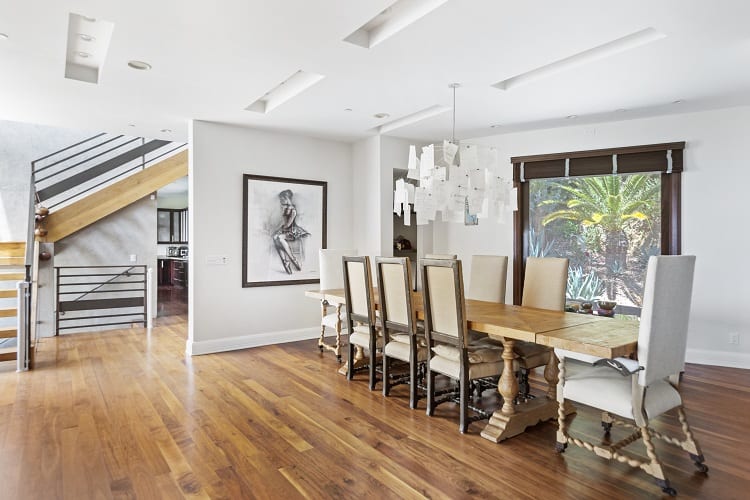 dining room with hardwood floors and carved wood table and chairs