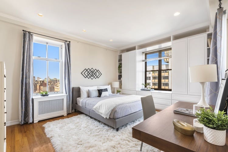 bedroom of a condo in the Oliver Cronwell building in New York