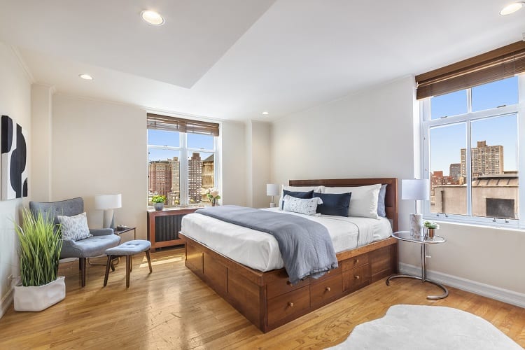 bedroom of a condo in the Oliver Cronwell building in New York.