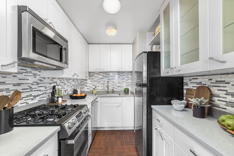 kitchen of a 2-bedroom condo in the Oliver Cronwell building in New York.