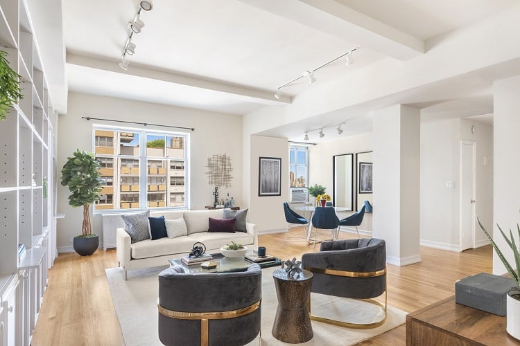 Living room of a 2-bedroom condo in the Oliver Cronwell building in New York.